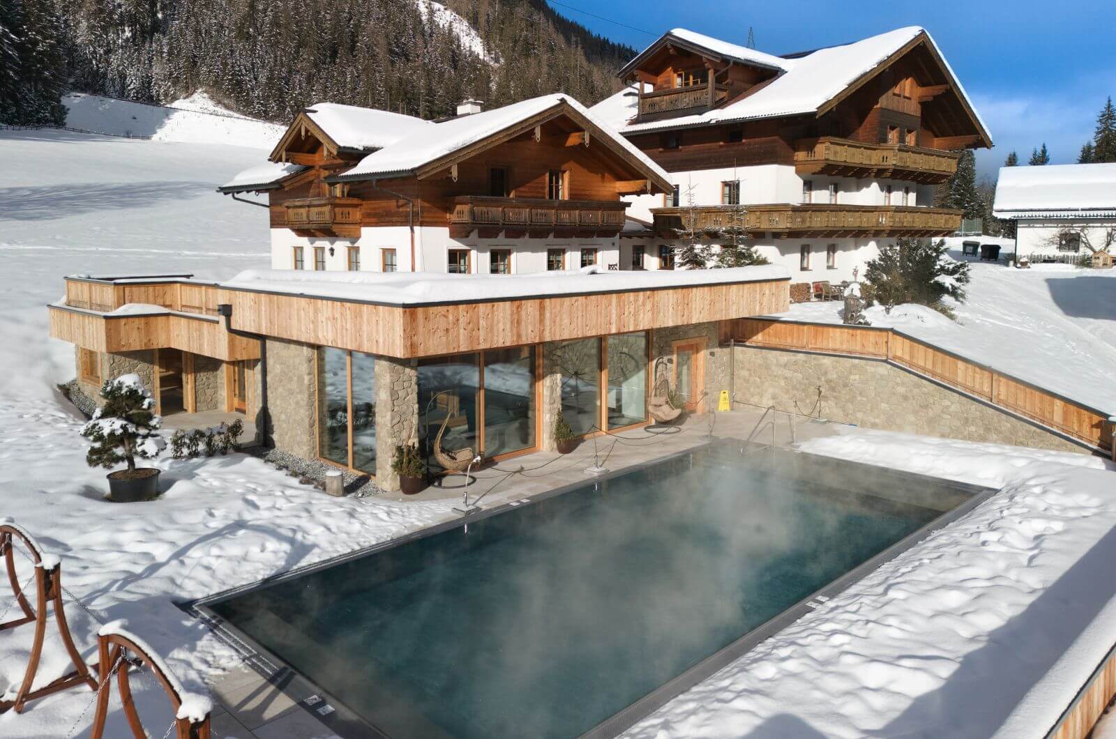 Ferienwohnungen-mit-beheiztem Pool-Skiurlaub-bezahlbar-Familienurlaub-Urlaub-mit-Kind-Salzburgerland-Ferienhaus-Bauernhof-Hinterrohrgut